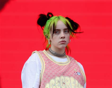 Pop star Billie Eilish appears to take a selfie while sucking dick in the photo above, and then bounces her big bulbous boob in the video clip below. Clearly Billie enjoys nothing more than gobbling down man meat and undulating her enormous udders…. And while both practices are certainly blasphemous activities; anything that keeps Billie from ...